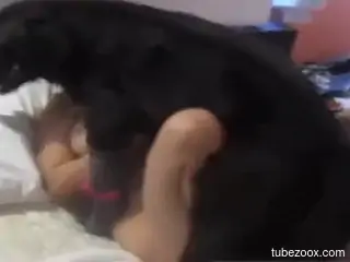 Naked woman filmed in her bedroom when she fucks with the dog